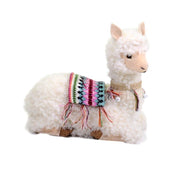 Llama blanca sentada con cascabeles cm28x13h29