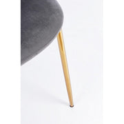 Silla de salón en terciopelo gris con patas doradas