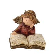 Ángel de resina con libro dorado cm19x17h15,5