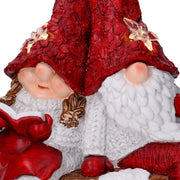 Resina LED Papá Noel con niño rojo cm40x26h15
