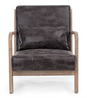 Sillón de piel sintética con cojín de estilo vintage.