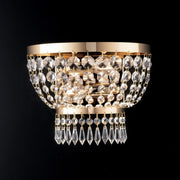 Aplique imperial de hierro y latón dorado con dos luces 27x h22 cm