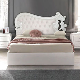 Cama doble en madera tallada con cabecera rellena en eco -leather 185x204xh.160 cm