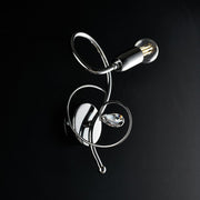 Aplique de hierro cromado pulido con pedrería cristal 1 luz 15xh.25 cm